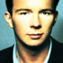 Rick Astley na okadce pyty "Hold Me in Your Arms" z 1988 roku