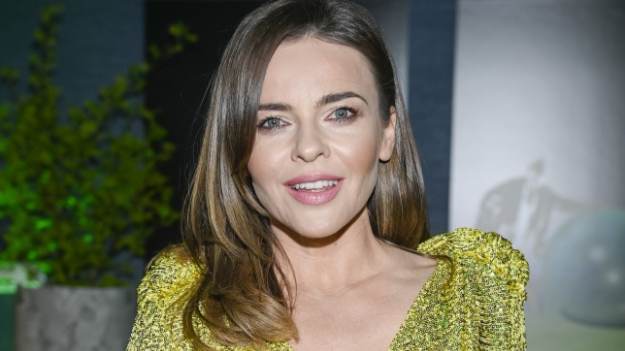 RMF Extra: Edyta Herbuś pręży ciało na drabinie. Artystka podgrzewa atmosferę! "Zjawiskowa" [FOTO]