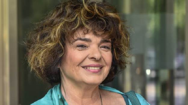 RMF Extra: Katarzyna Grochola wskoczyła do przydomowego basenu. "Niczym syrena w bikini" [FOTO]