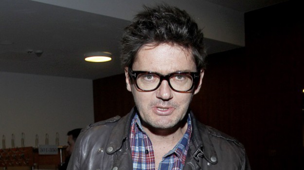 RMF Extra: Kuba Wojewódzki z partnerką, która pozuje w samej bieliźnie. Uwagę internautów zwrócił pewien szczegół...