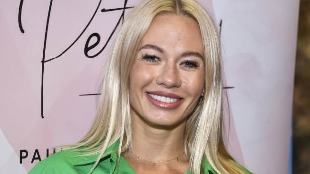 RMF Extra: Kasia Dziurska szokuje w szpagacie. Trenerka rozciąga się w nietypowym miejscu [FOTO]