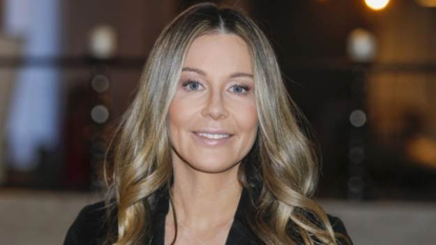 RMF Extra: Rozenek-Majdan w skąpym stroju kąpielowym. Trzyma kraby zamiast karpi. "Smacznego!"