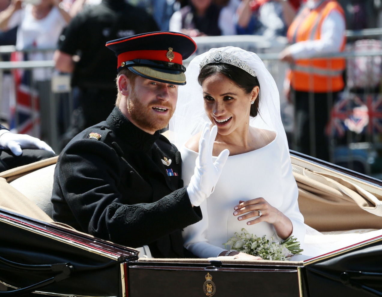Meghan opublikowała zdjęcia ze ślubu. Z Harrym nie zwracali uwagi na fotografa